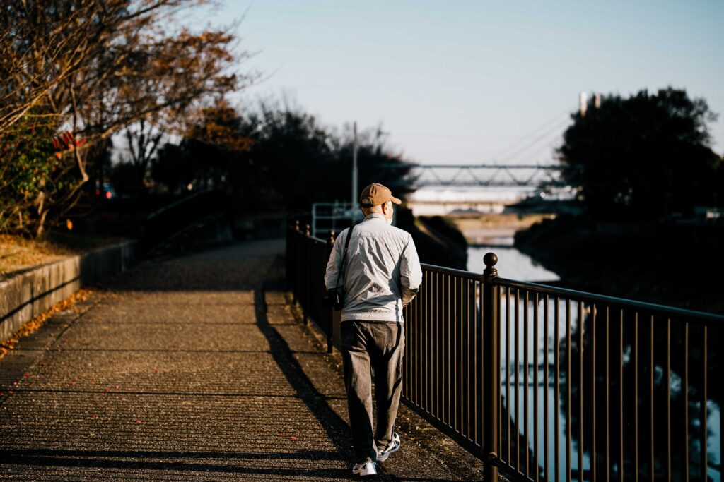 Sample photo from the Sigma 65mm f/2 showing background blur with a full body shot