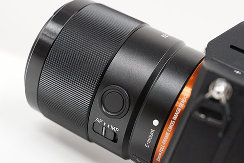 The customizable button and AF-MF switch on the Sony FE 35mm f/1.8 lens