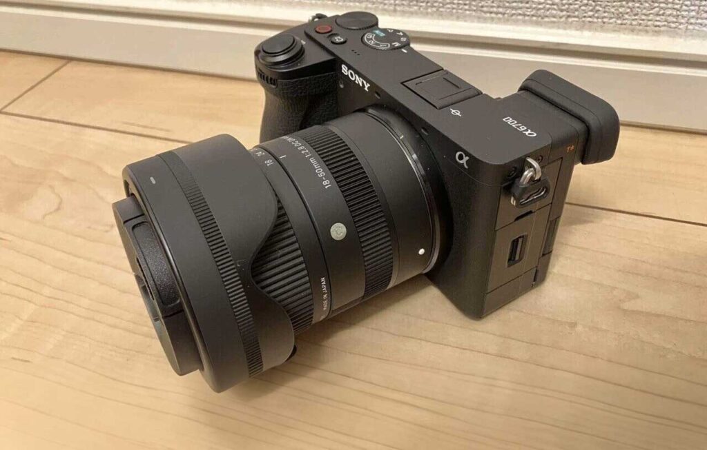 Sigma 18-50mm mounted on Sony a6700