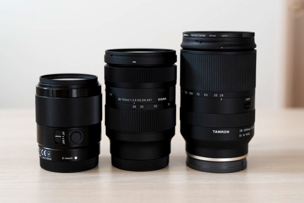 Size comparison between Sigma 28-70mm f/2.8 DG DN and the Tamron 28-200mm and Sony 35mm f/1.8 FE